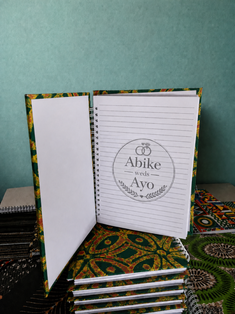 Premium Adire-accented hardcover notebook - practical corporate gift ideas for employees